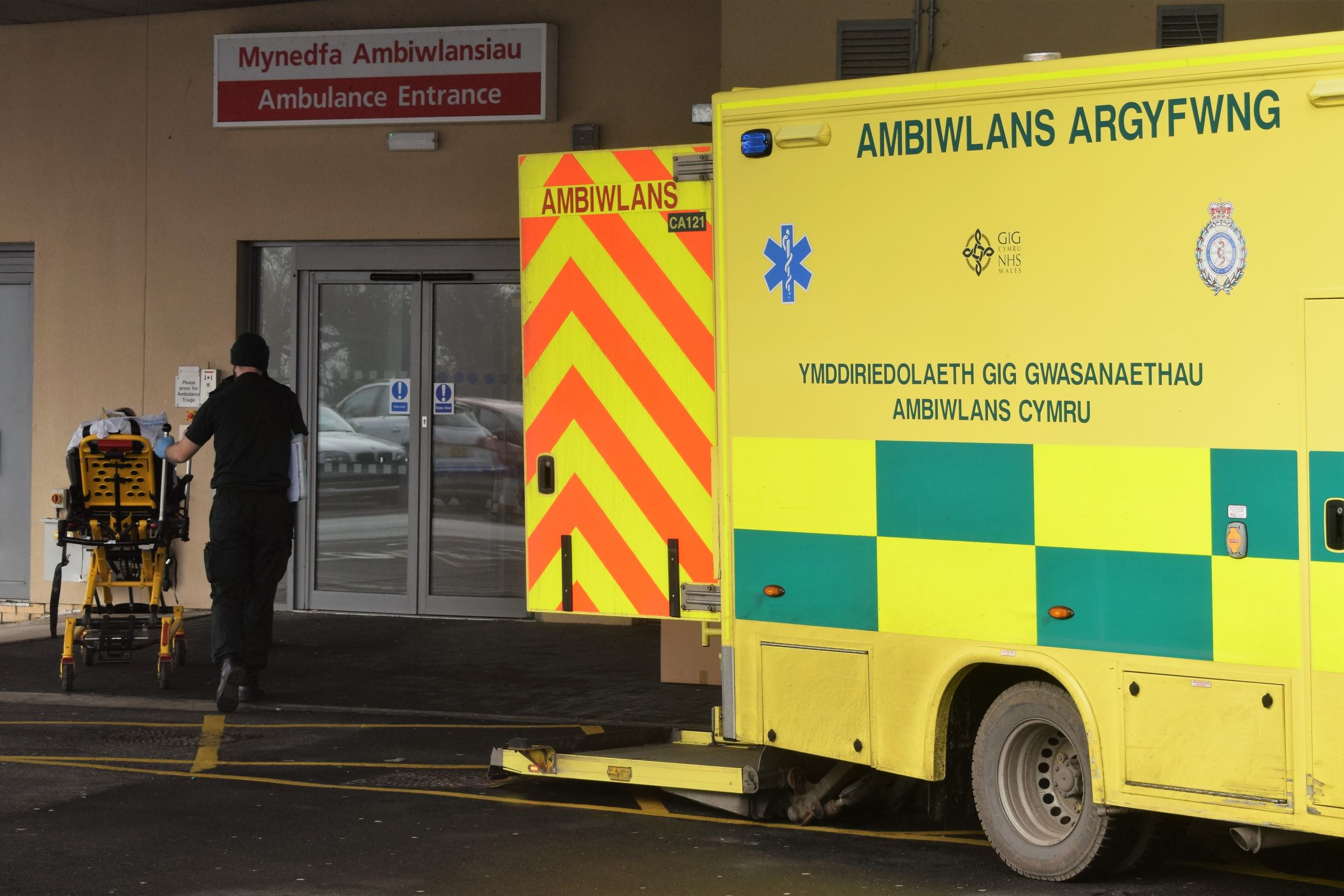 An ambulance arrives at a hospital with a patient